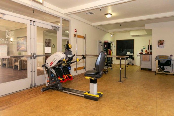 An indoor gym area featuring fitness equipment for workouts.
