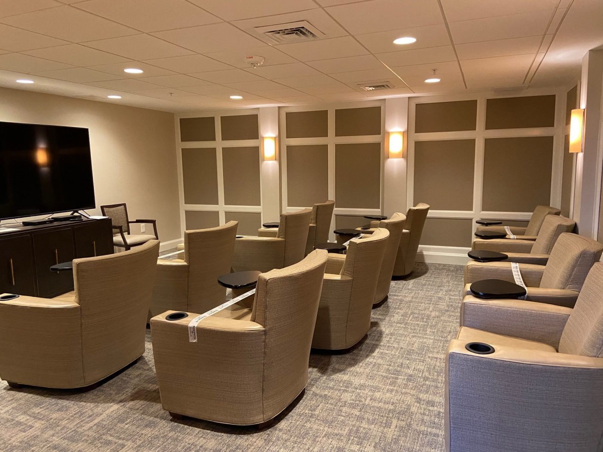 A comfortable lounge area with arranged seating and soft lighting.