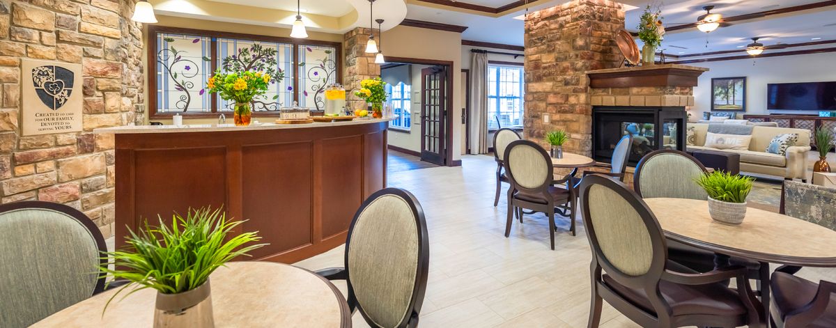 A cozy lobby with comfortable seating and a reception desk.