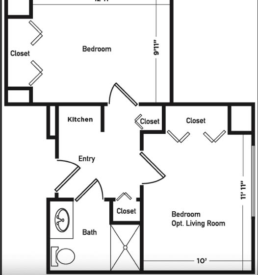 A floor plan showing the layout of an apartment with bedrooms, a kitchen, a bathroom, and closets.
