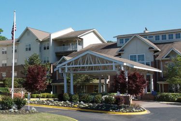A well-landscaped residential building with a welcoming entrance.