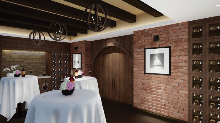 A cozy wine cellar room featuring brick walls, an arched wooden door, and elegantly set tables.