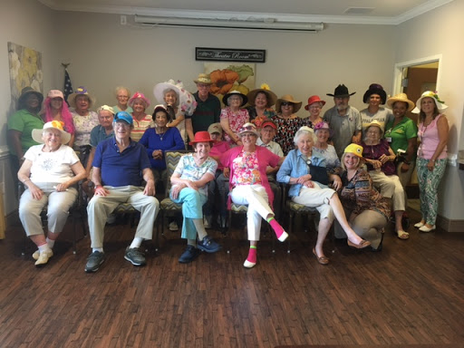 A joyful gathering of seniors enjoying a special celebration.