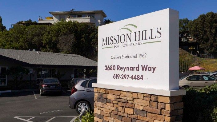 Sign for Mission Hills Real Estate located at 3460 Reynard Way.