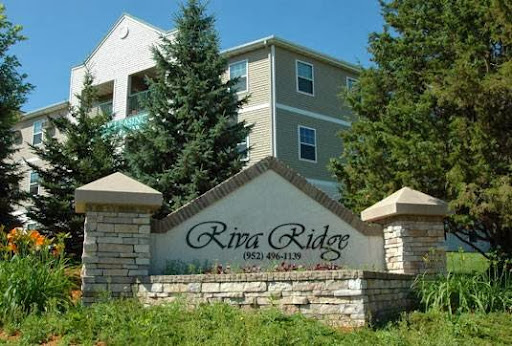 Welcome to River Ridge Apartments, nestled among the trees.