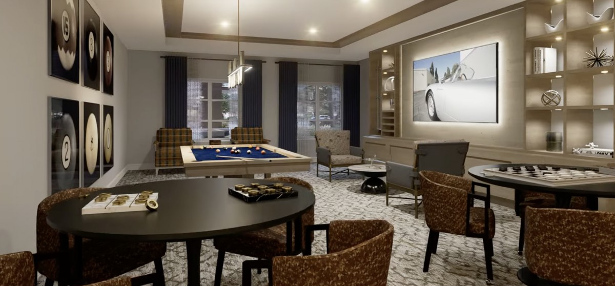 A cozy living room featuring stylish furniture and elegant lighting.