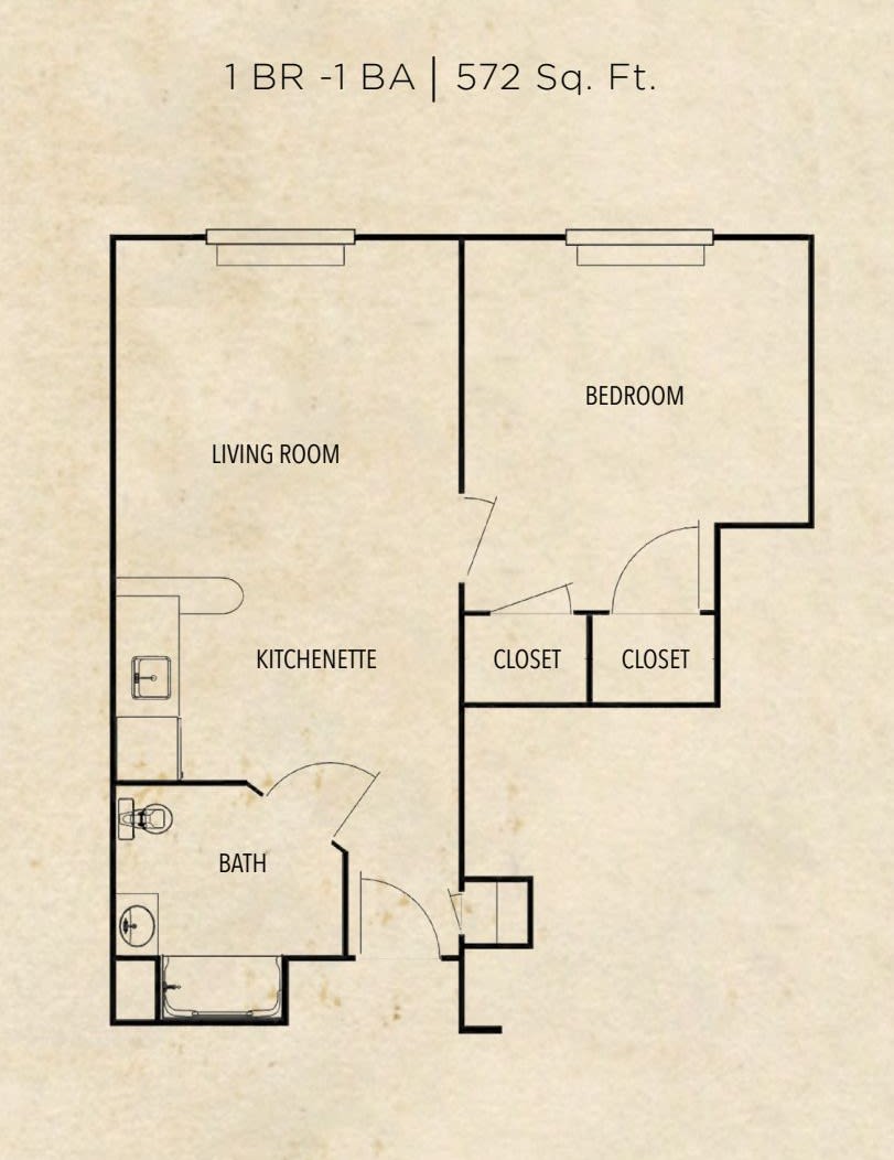 A floor plan of a one-bedroom apartment featuring a living room, bedroom, kitchen area, bathroom, and closets.