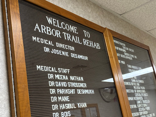Welcome sign displaying the staff directory at Arbor Trail Rehab.