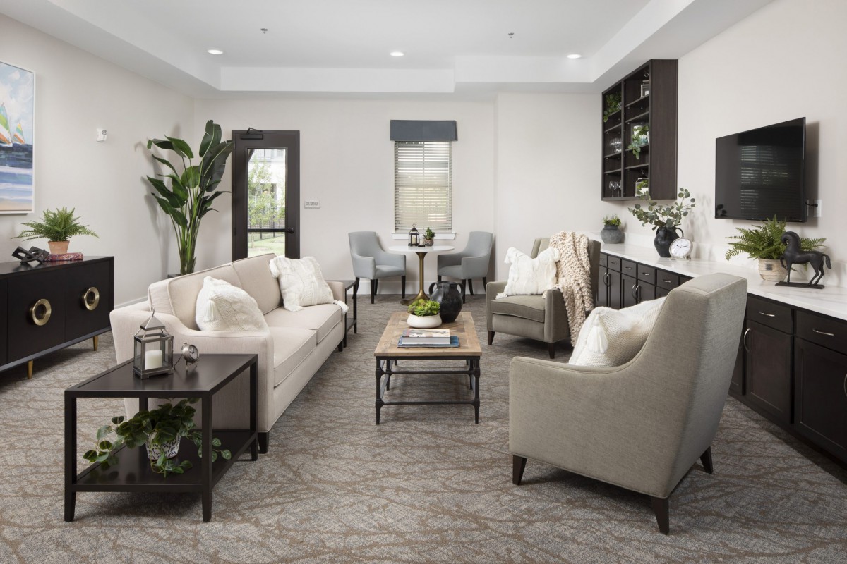 A modern living room with elegant furnishings and decor.