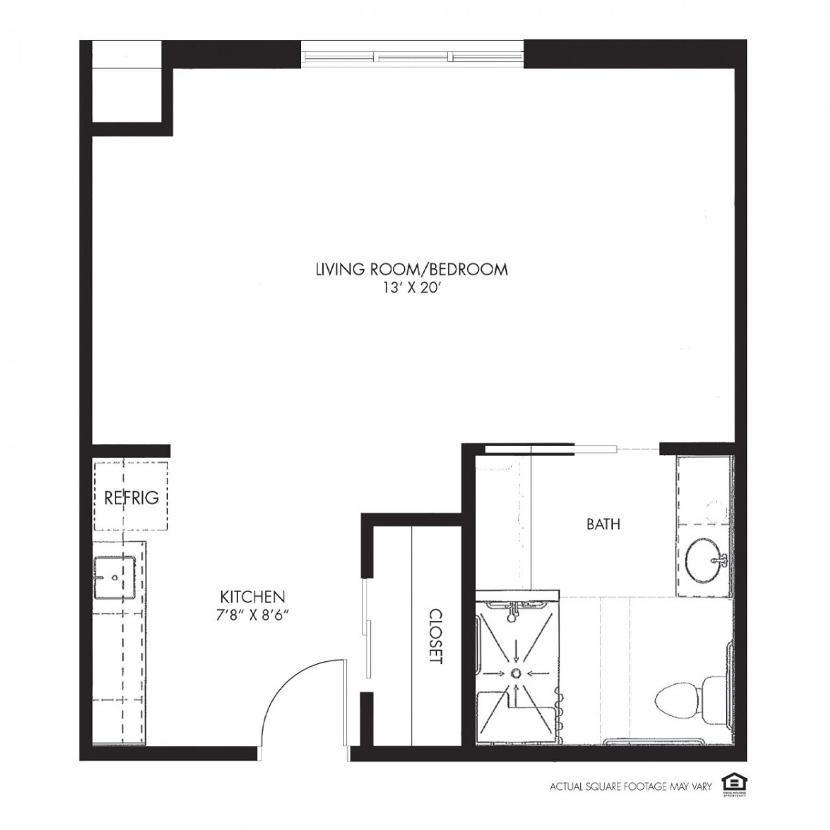 Floor plan of a studio apartment with kitchen and bathroom layout.