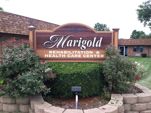 Entrance sign for Marigold Rehabilitation & Health Care Center.
