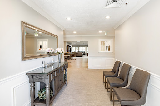 A serene waiting area featuring comfortable seating and elegant decor.