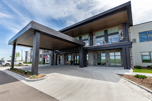 A contemporary commercial building featuring a sleek entrance and modern architectural design.