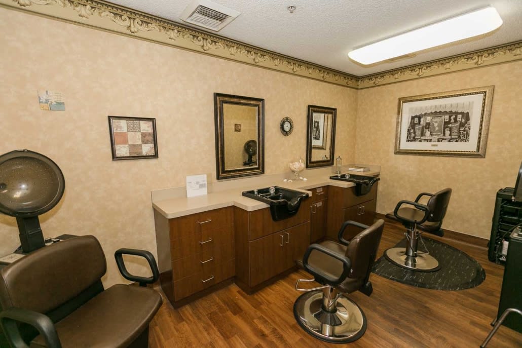 A cozy hair salon interior with styling chairs and mirrors.