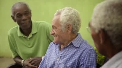 A group of senior friends enjoying a conversation.