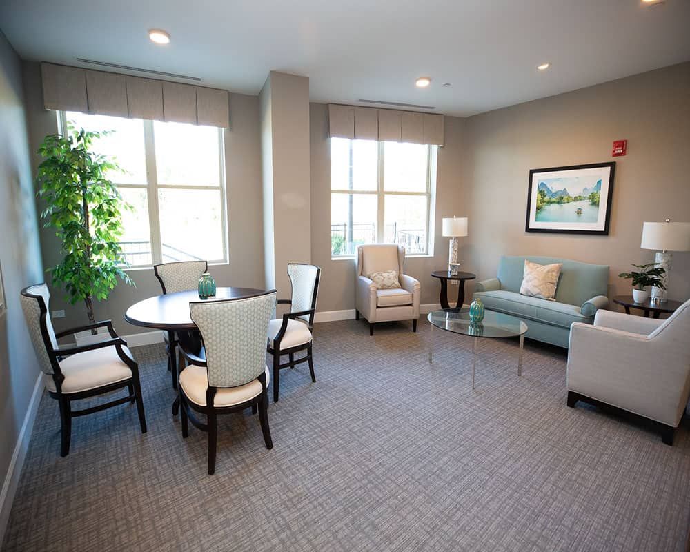 A cozy living room with comfortable seating and natural light.