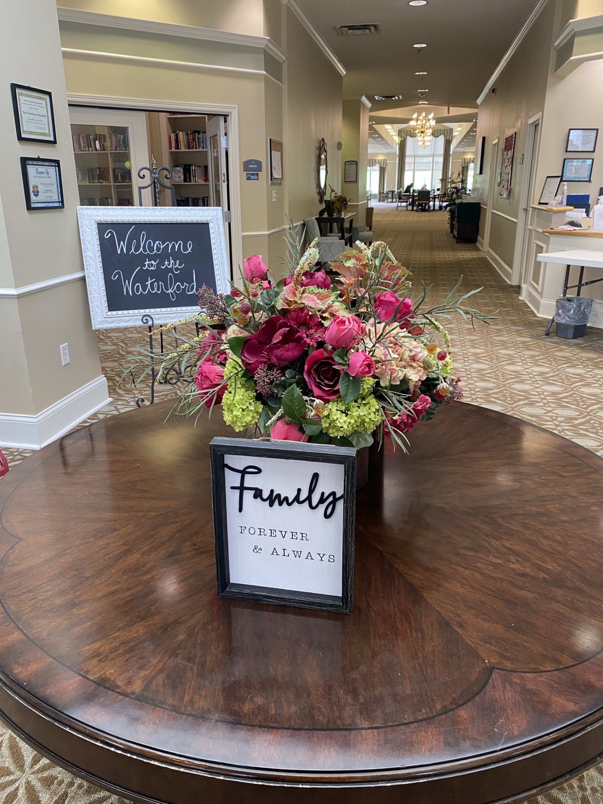 A welcoming floral arrangement on a table in a well-decorated interior.