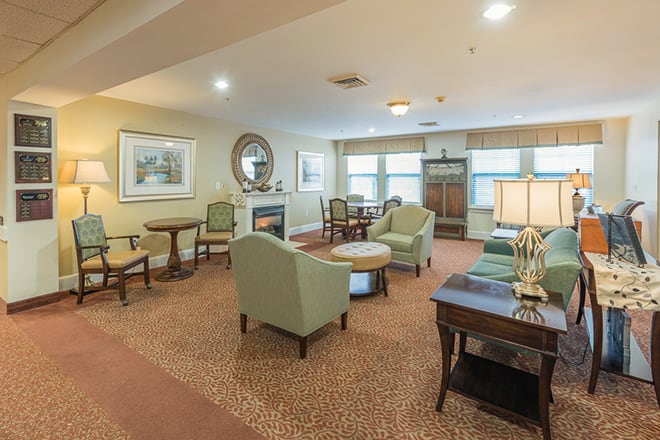A cozy living room with comfortable seating and warm decor.