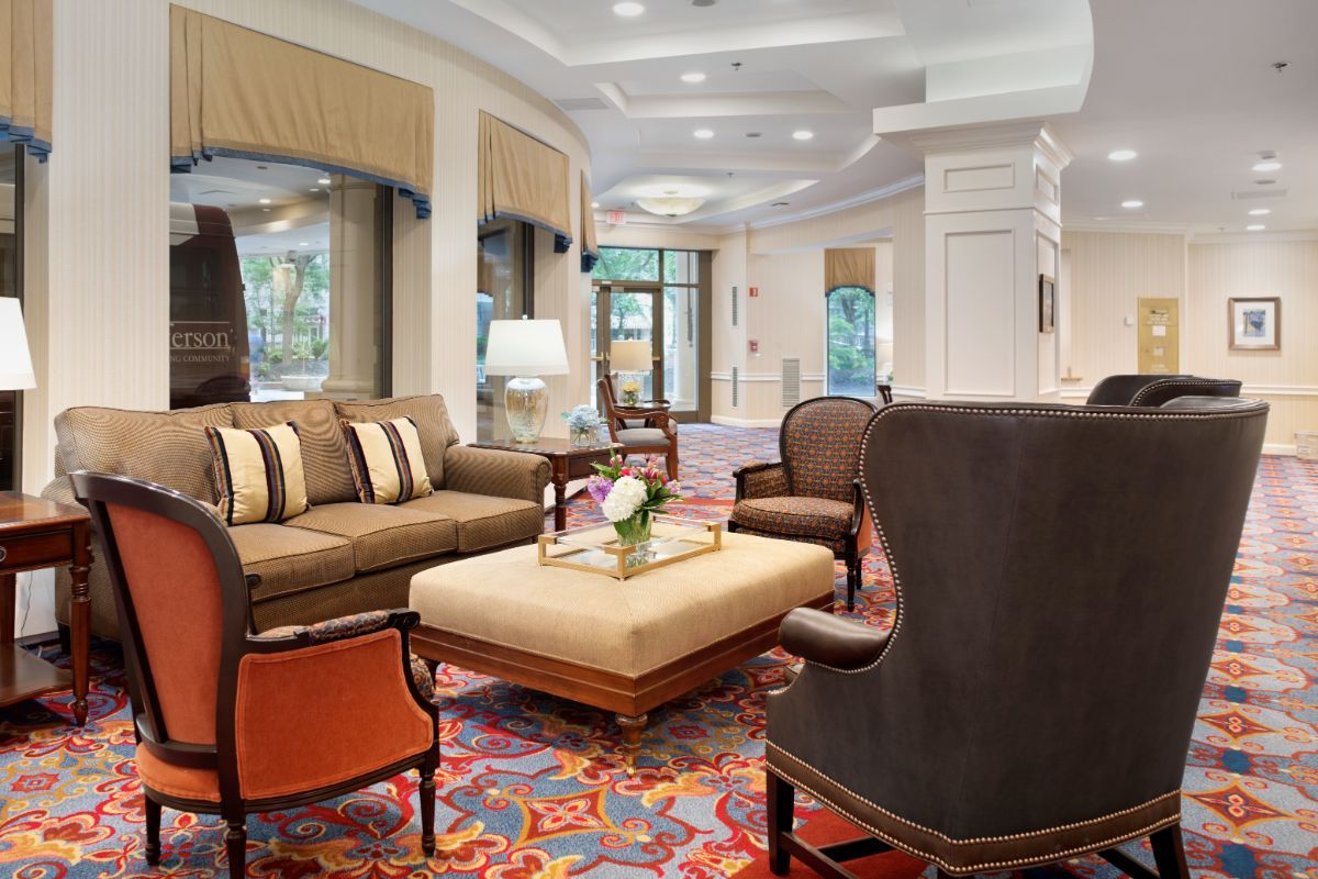 A well-furnished hotel lobby with comfortable seating and elegant decor.