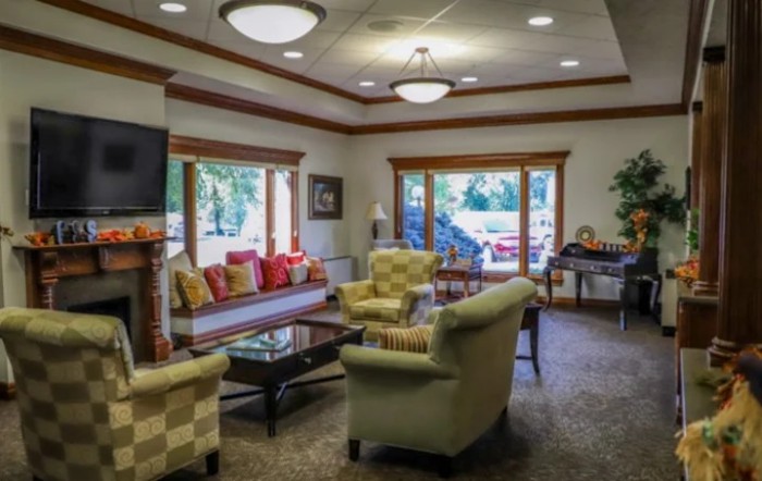 A cozy living room with comfortable seating and natural light.