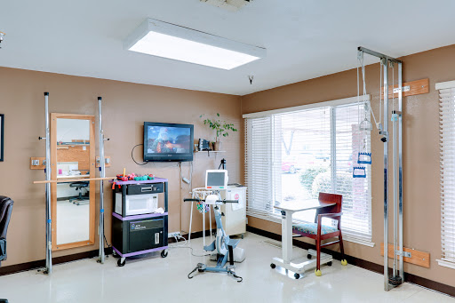 A modern hospital room equipped for patient care with essential medical equipment.
