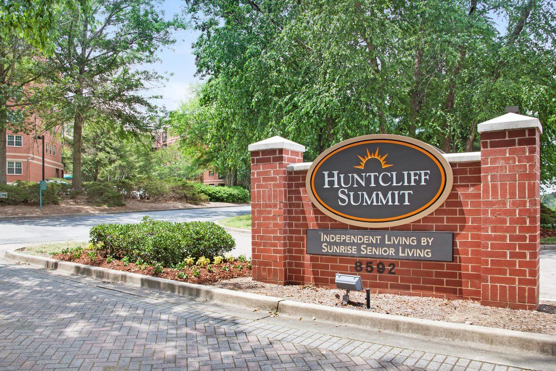 Entrance sign for Huntcliff Summit retirement living community.