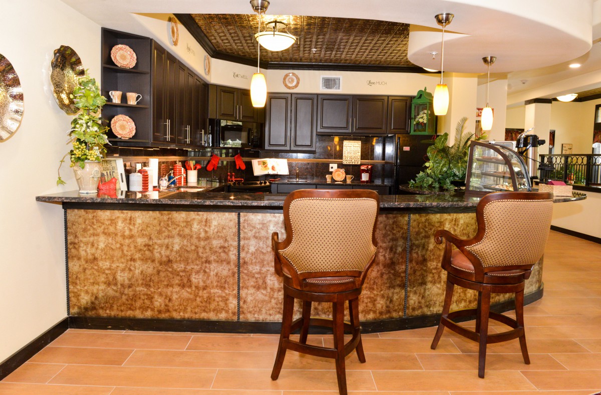 A cozy home bar with wooden accents and comfortable seating.