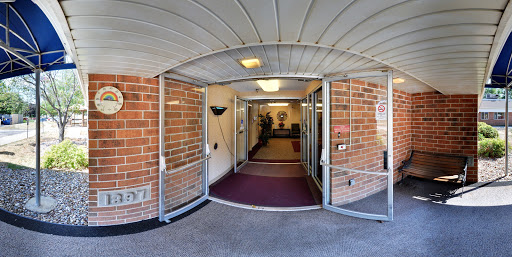 A welcoming entrance leading into a well-lit hallway.