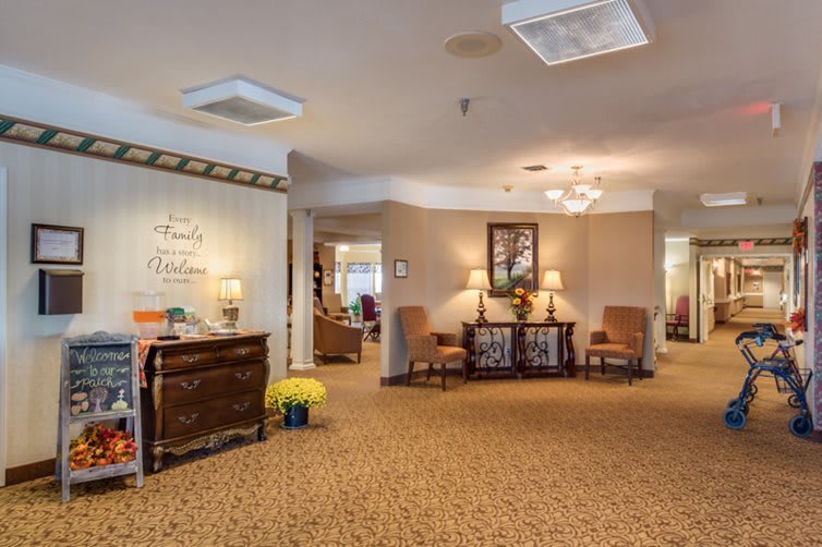 A warmly decorated lobby area with comfortable seating and elegant furnishings.