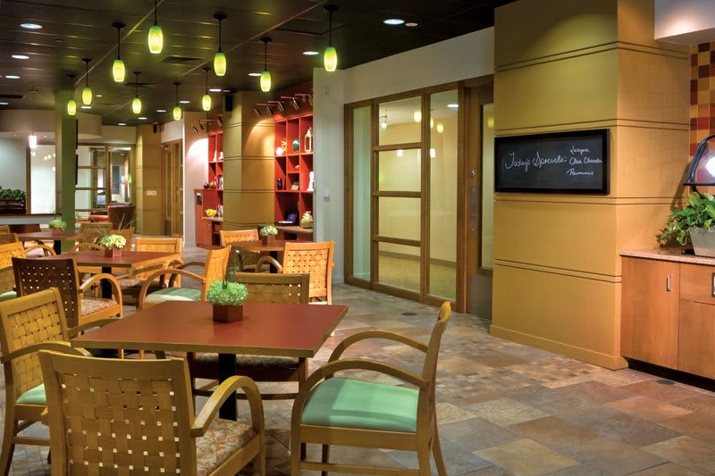 Modern restaurant interior with elegant seating and ambient lighting.