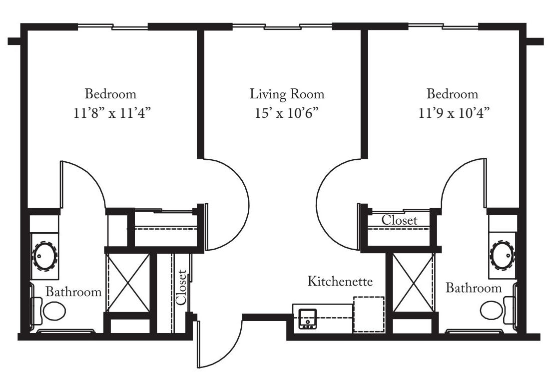 A detailed floor plan of an apartment showing bedrooms, a living room, and a kitchenette.