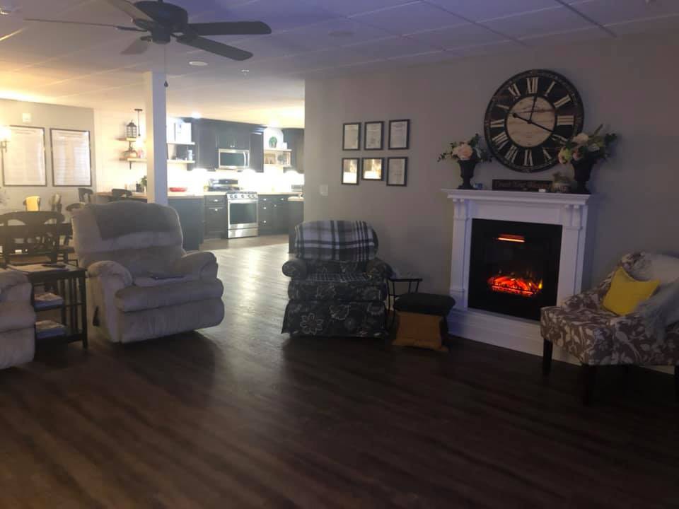 Cozy living room with a fireplace and comfortable seating.