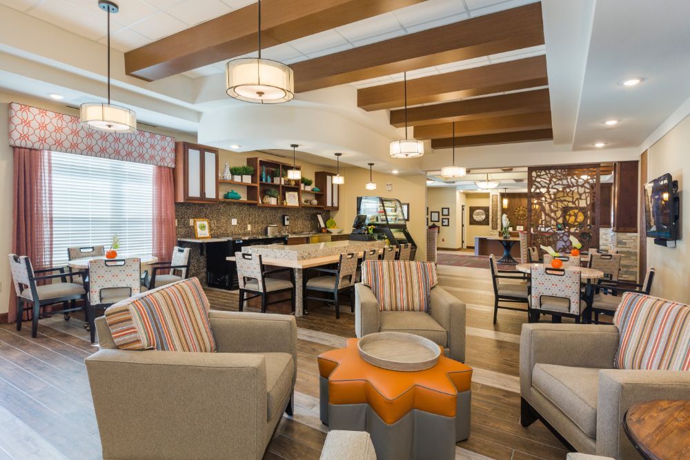 A modern and cozy living room with comfortable seating and stylish lighting.