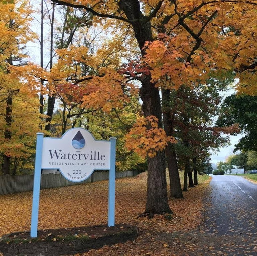 A scenic view of Waterville in autumn, showcasing vibrant fall foliage.