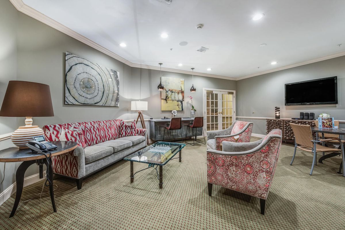 A modern living room with comfortable seating and stylish decor.