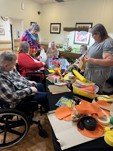 Residents enjoying a vibrant arts and crafts session, fostering creativity and social connections.