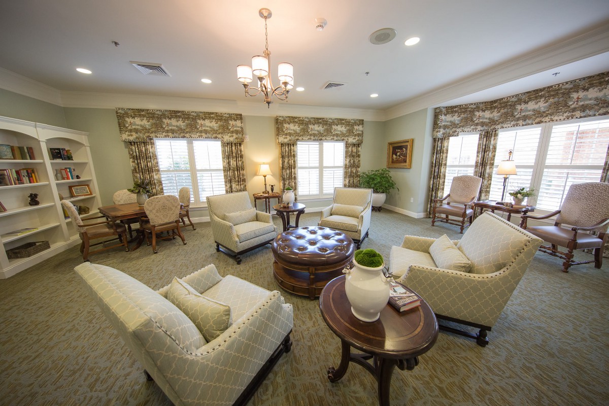 A cozy living room with elegant furniture and soft lighting.