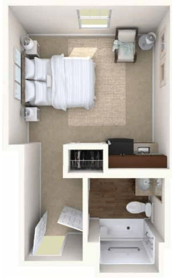 A compact bedroom floor plan featuring a bed, storage, and bathroom.