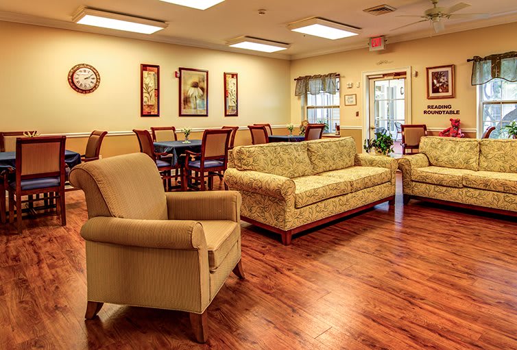 A cozy living room with comfortable seating and warm decor.