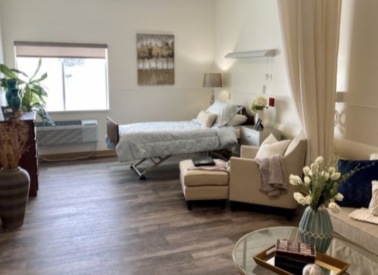 A cozy, modern bedroom with stylish decor and comfortable furniture.