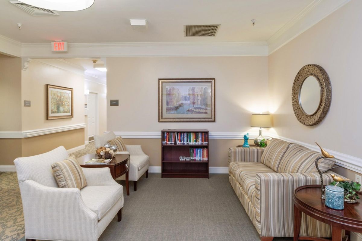A cozy waiting room with comfortable seating and tasteful decor.