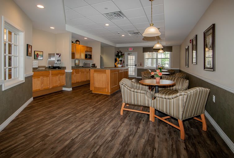 A cozy lounge area with comfortable seating and warm lighting.