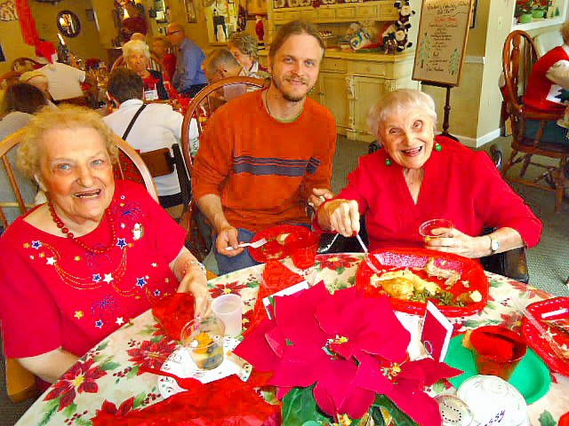A joyful group having a festive meal together.