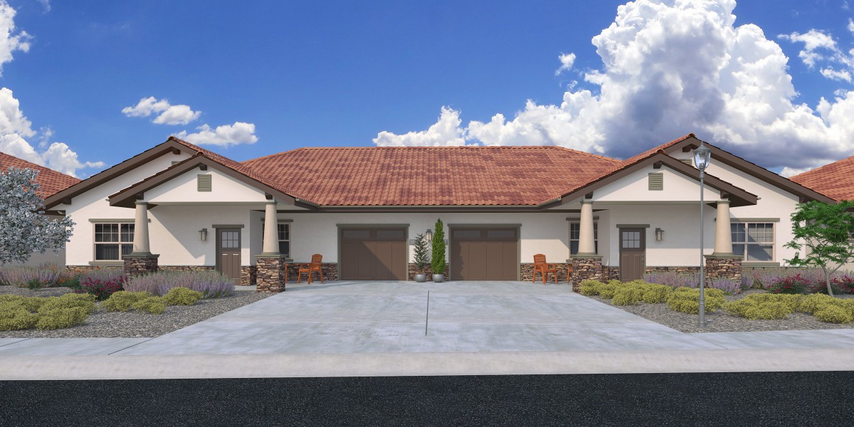A modern duplex with a shared driveway and two garages under a clear blue sky.