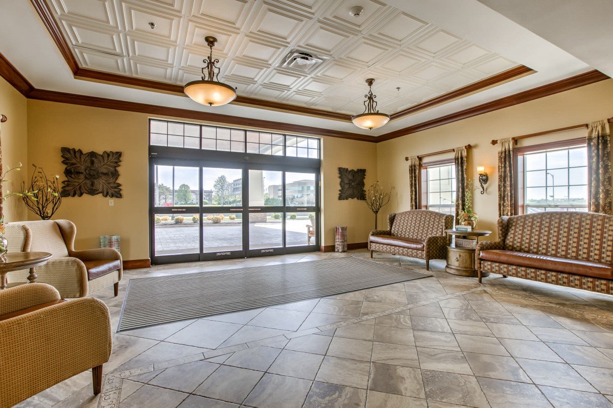 Spacious lobby area with stylish lighting and comfortable seating.