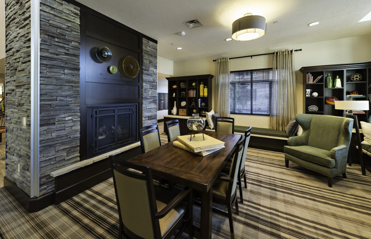 A modern dining room with stylish furniture and contemporary decor.