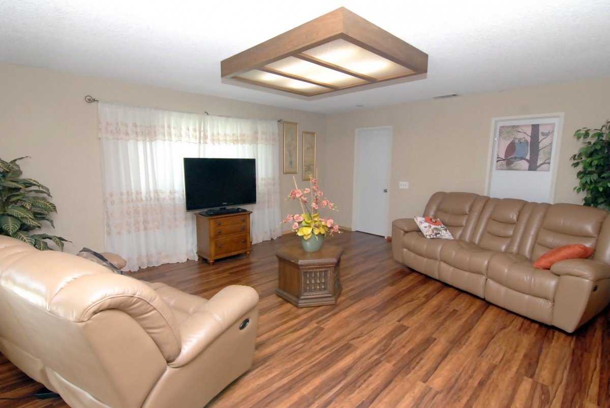 A cozy living room with comfortable seating and modern decor.
