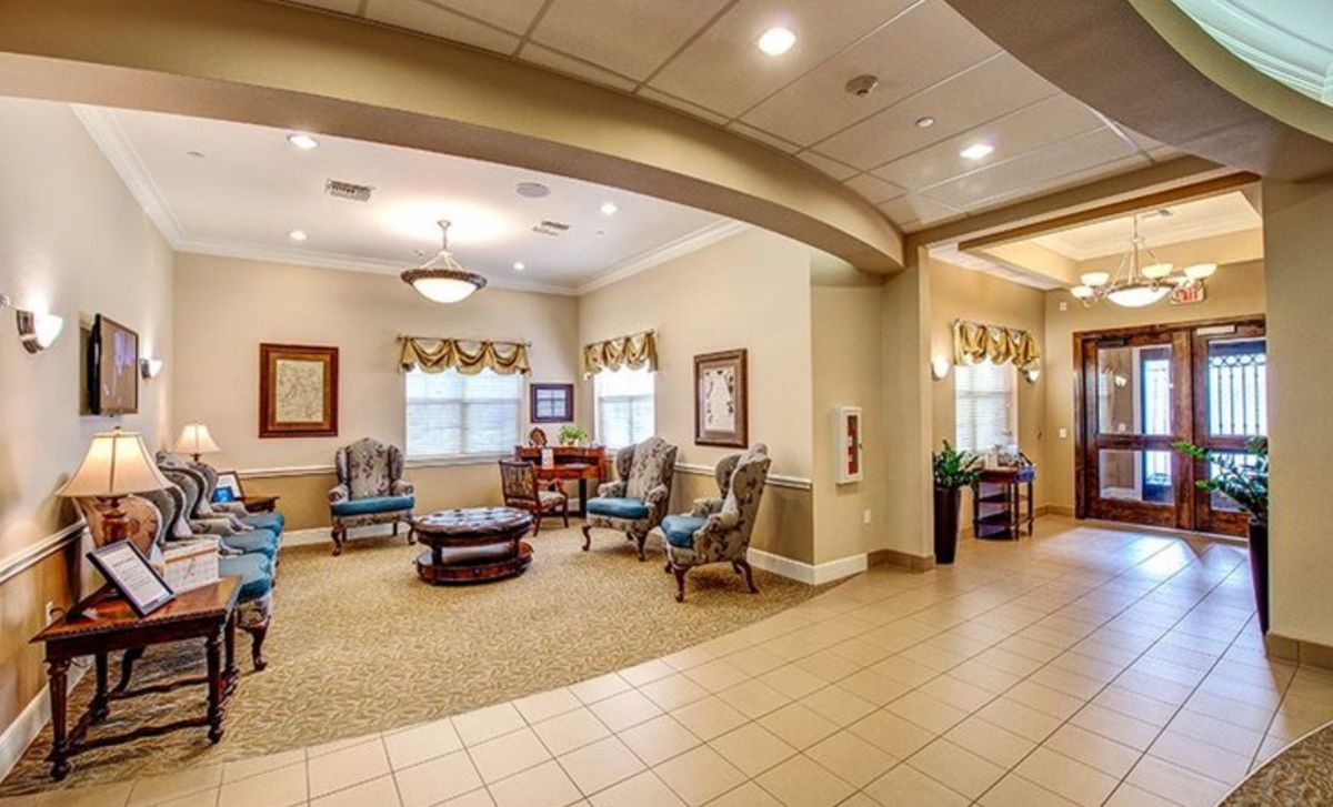 A well-decorated lobby with comfortable seating and elegant interior design.