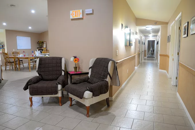 A cozy hallway with comfortable seating and soft lighting.