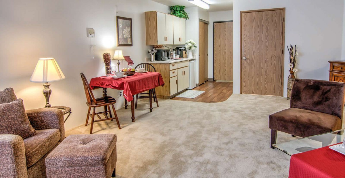 Cozy kitchenette and dining area in a home setting.